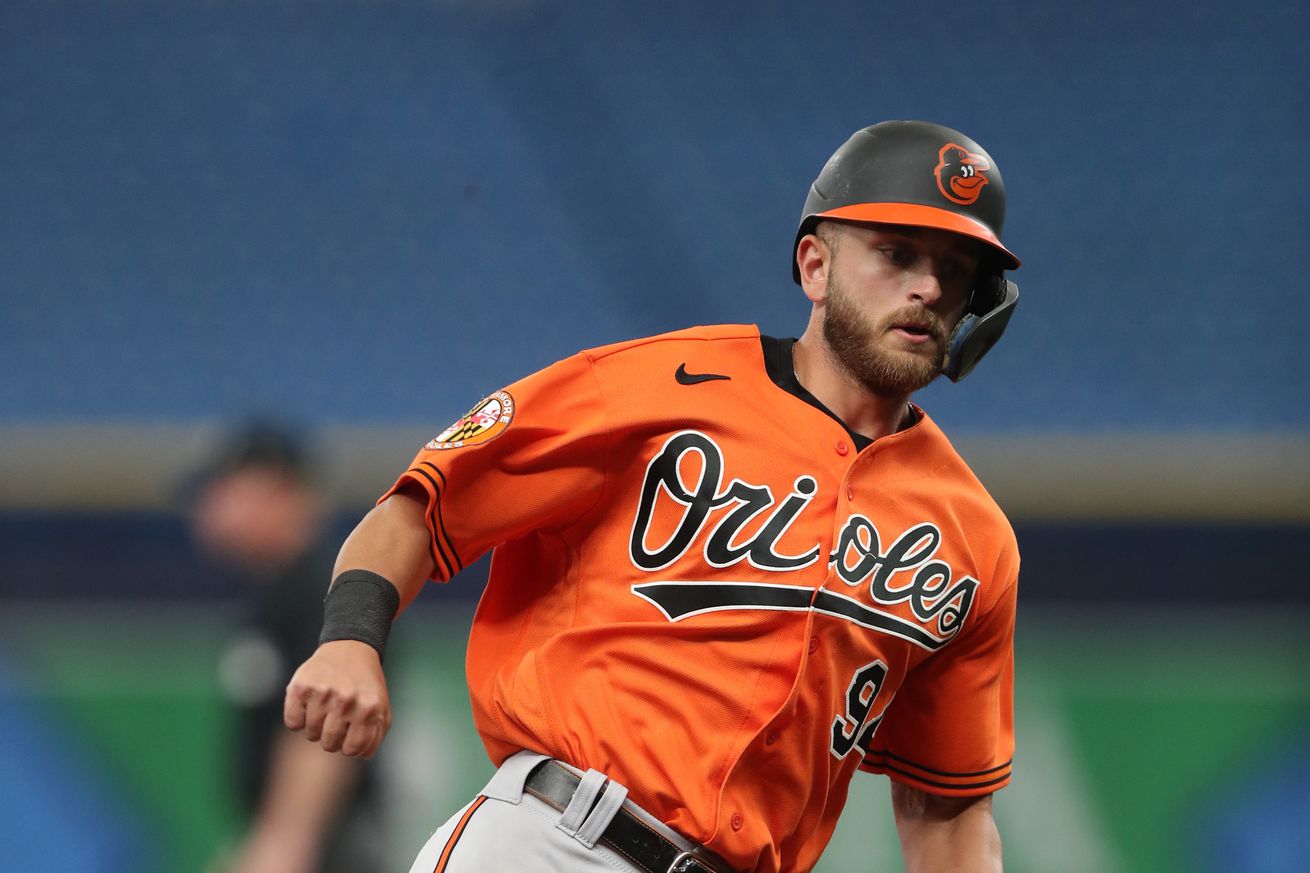 Connor Norby rounds third base during a spring training game at Tropicana Field.