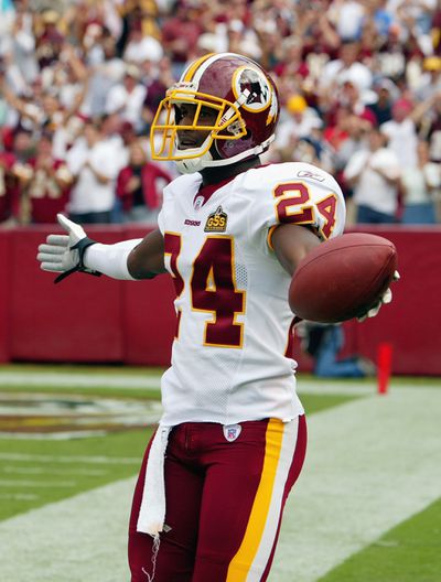 Champ Bailey celebrates interception