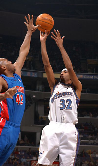 Richard Hamilton shoots a jump shot over Jerry Stackhouse.