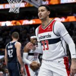 Washington Wizards forward Kyle Kuzma (33) celebrates after he makes a basket against the Dallas Mavericks