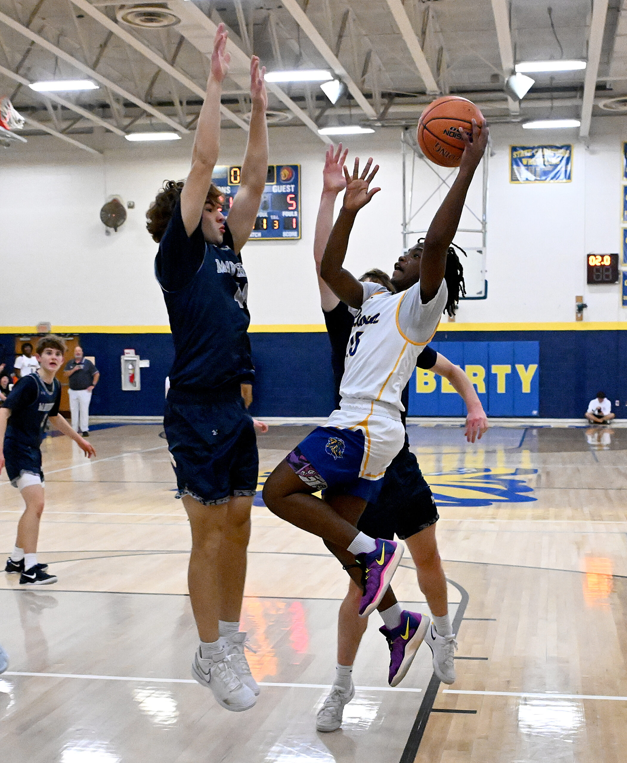 Liberty #15, Nate Gitau layup in the 1st half. Liberty...