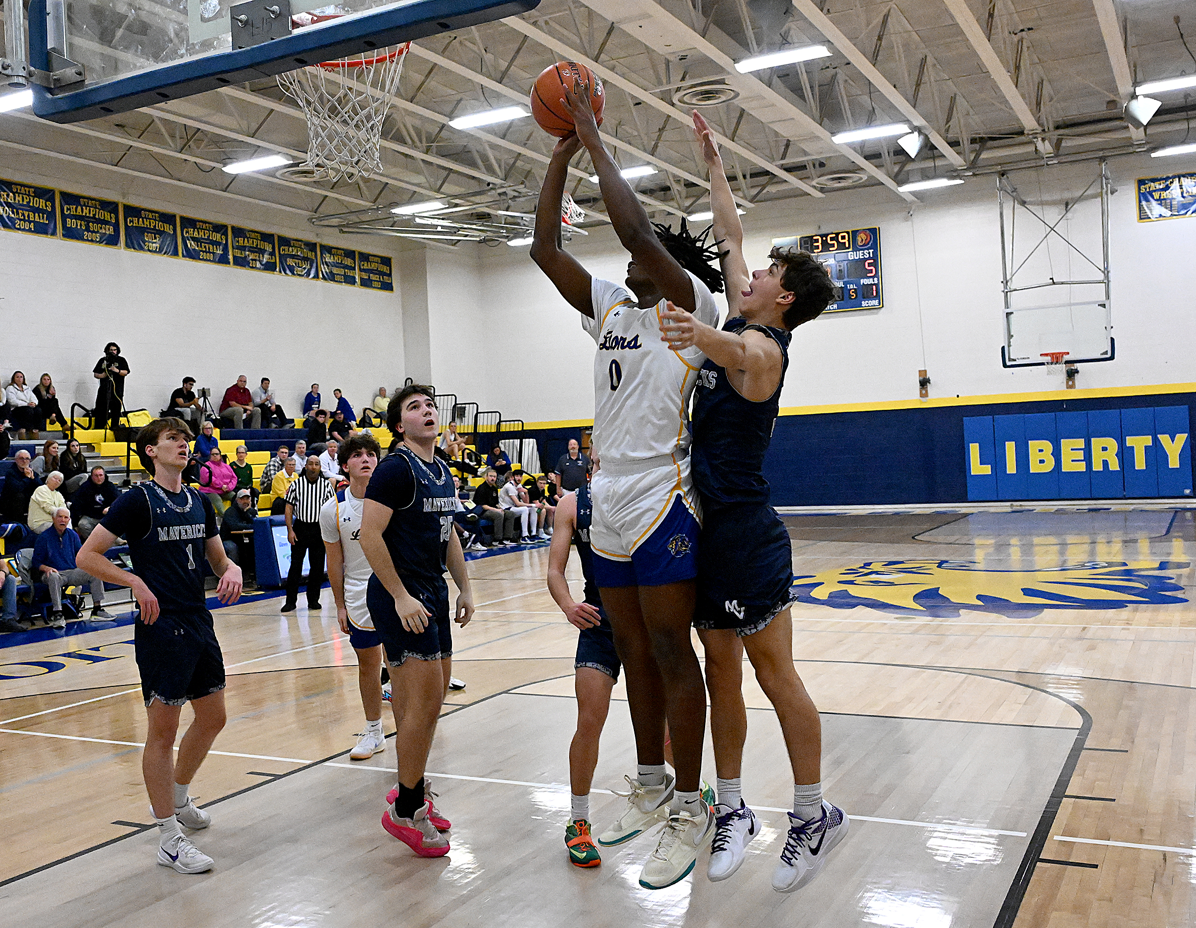 Liberty #0, Tristen West shoots two in the paint in...