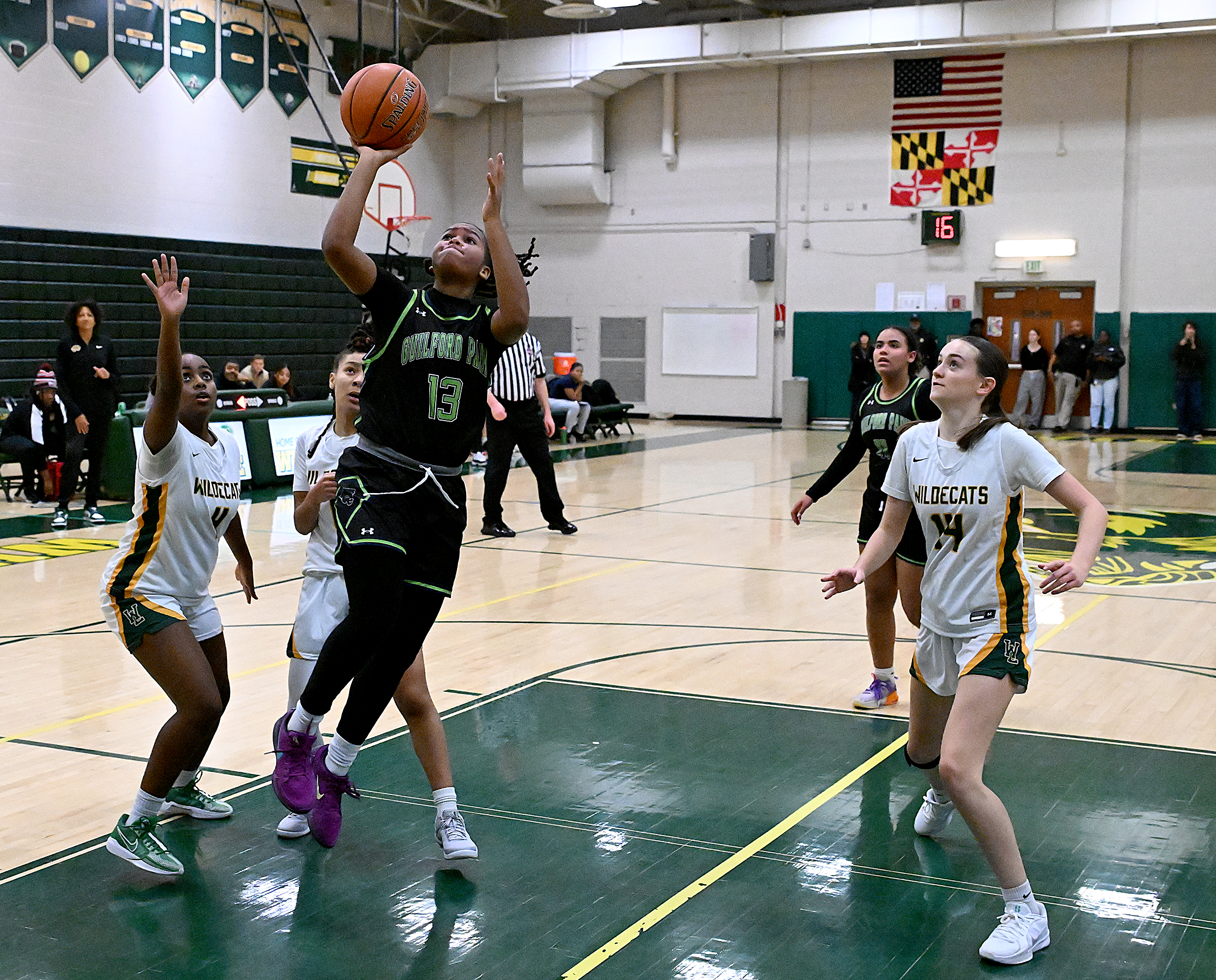 Guildford Park #13, Londyn Wiseman drives to the basket in...