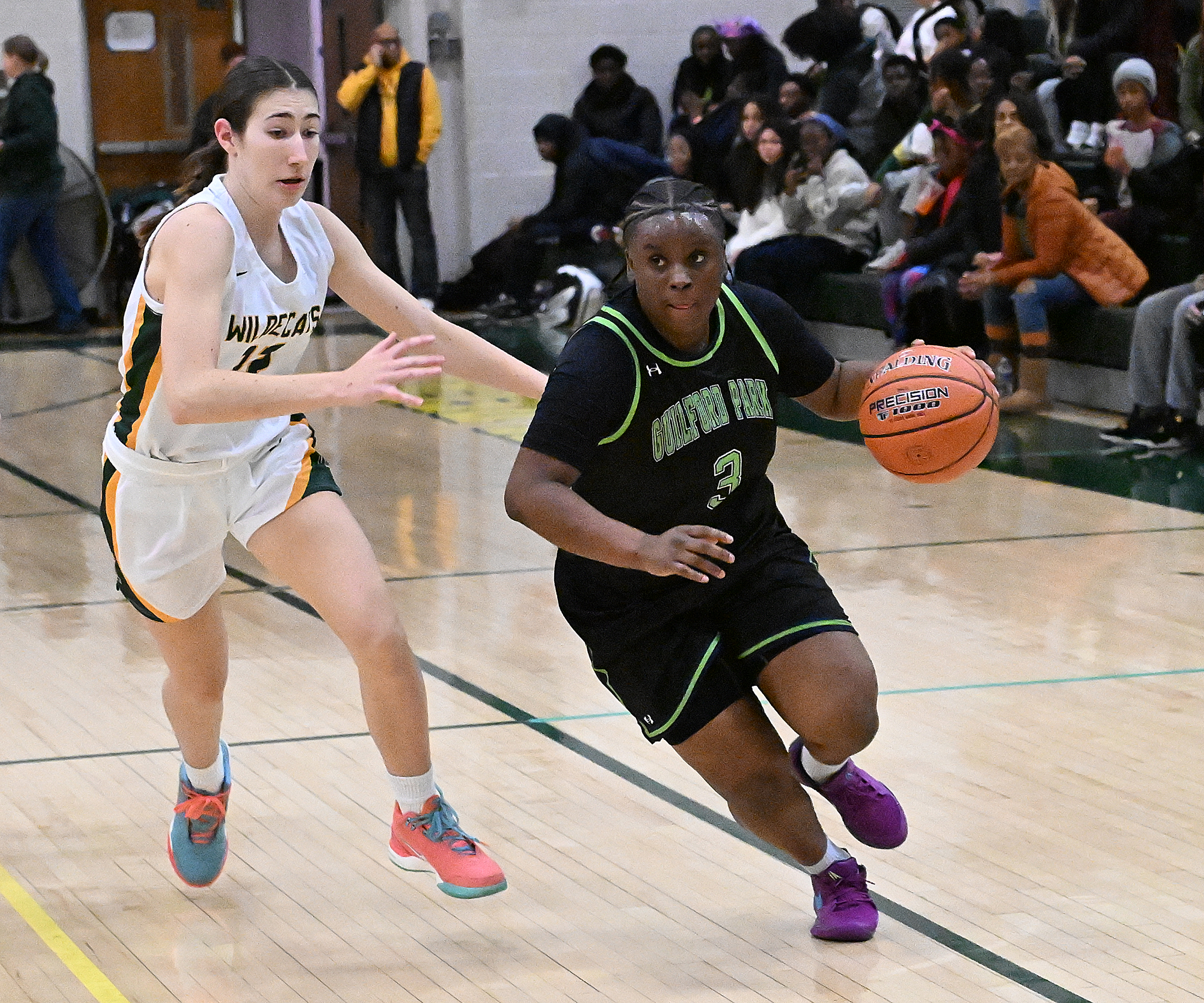 Guildford Park #3, Azauria Reed drives to the basket in...