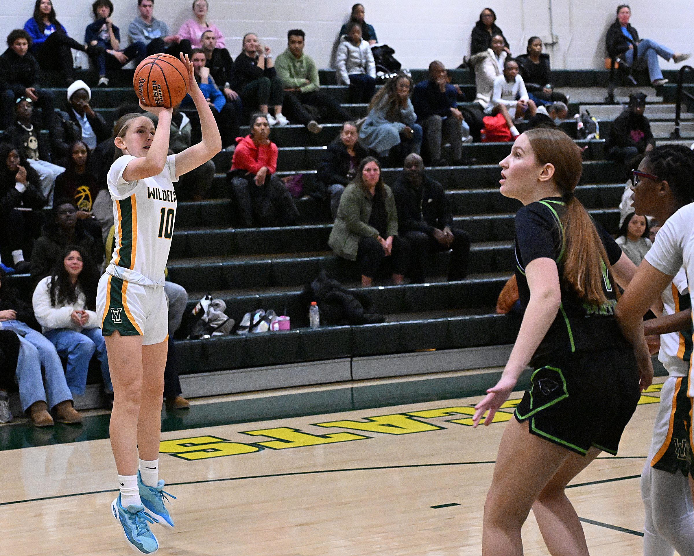 Wilde Lake #10, Maggie Shidle pull-up jumpshot for two in...