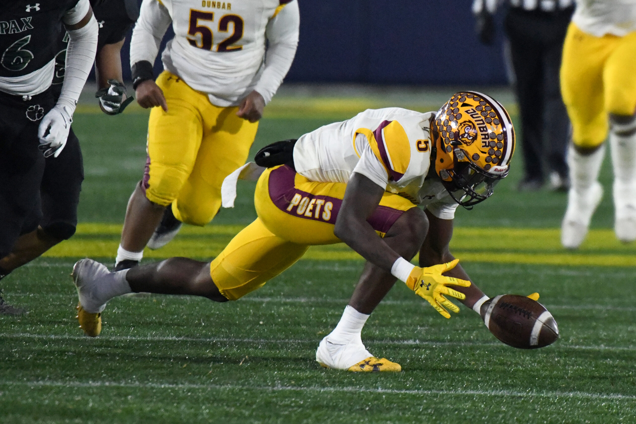 Brian Collins, Dunbar, recovers his fumble in the 4th quarter...