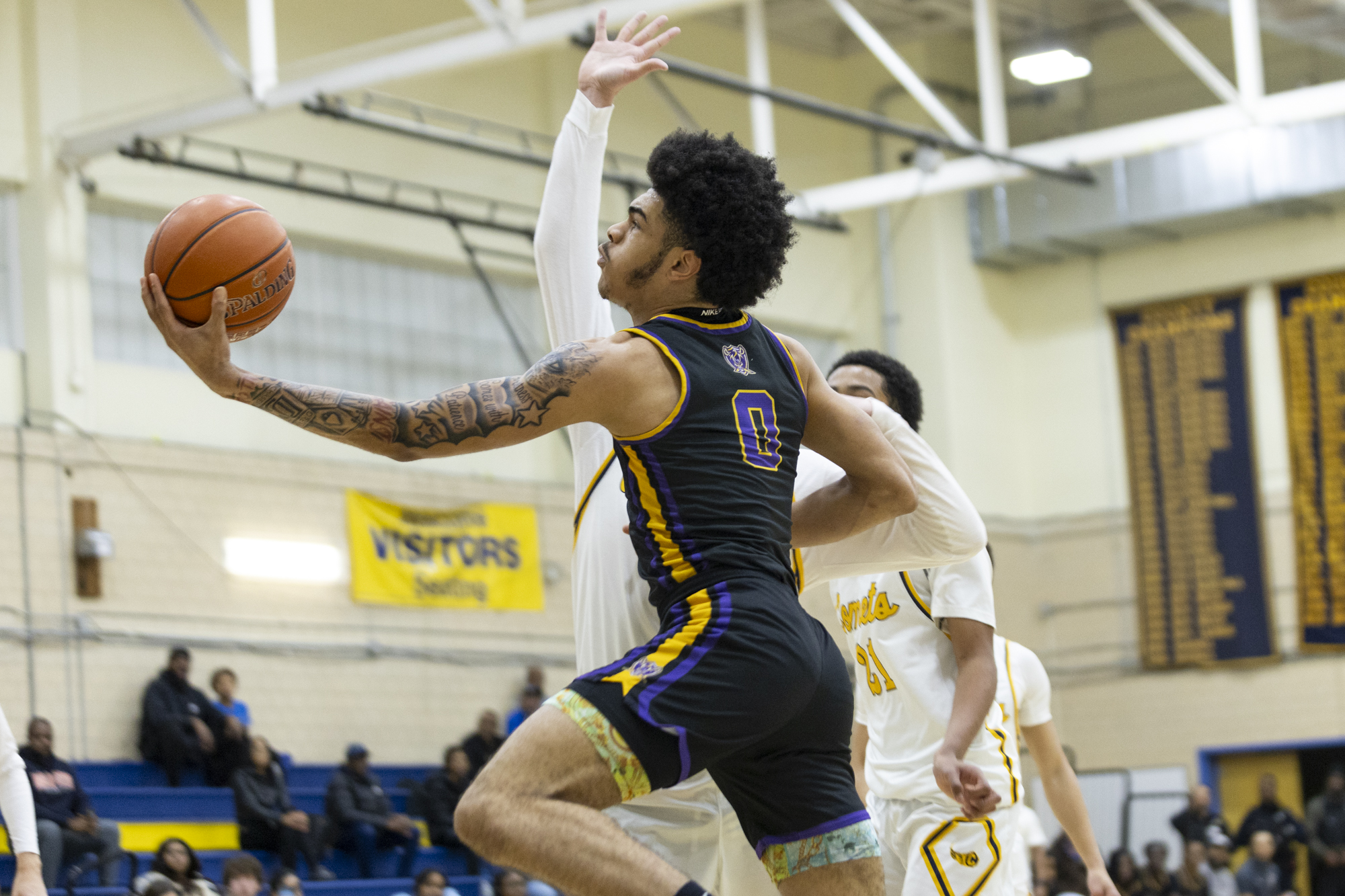 Loch Raven’s Earl Jordan goes in for a layup during...