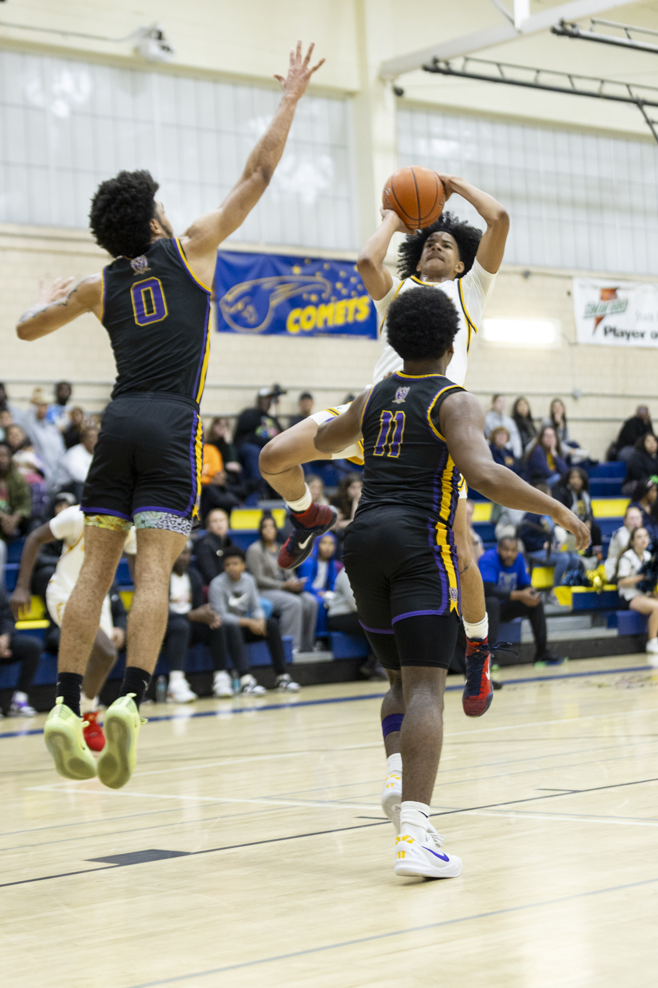 Gavin Edwards steps back for a shot against Loch Raven’s...