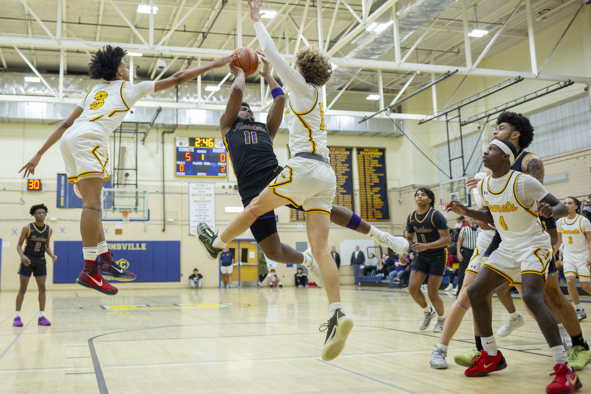 Loch Raven’s Tyler Brandon pulls up for a shot against...