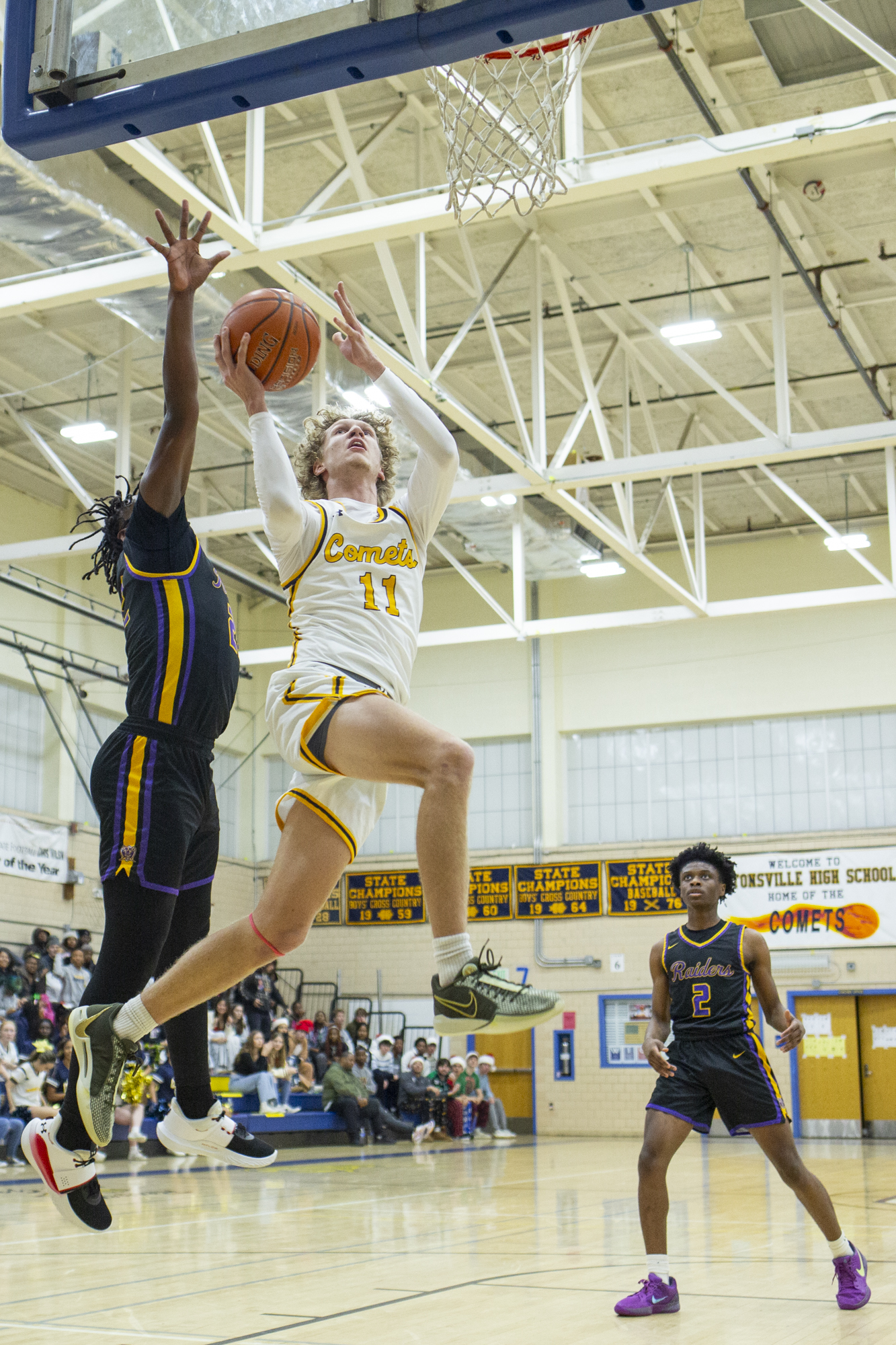 Catonsville’s Nate Holub-Smith goes in for a layup during the...