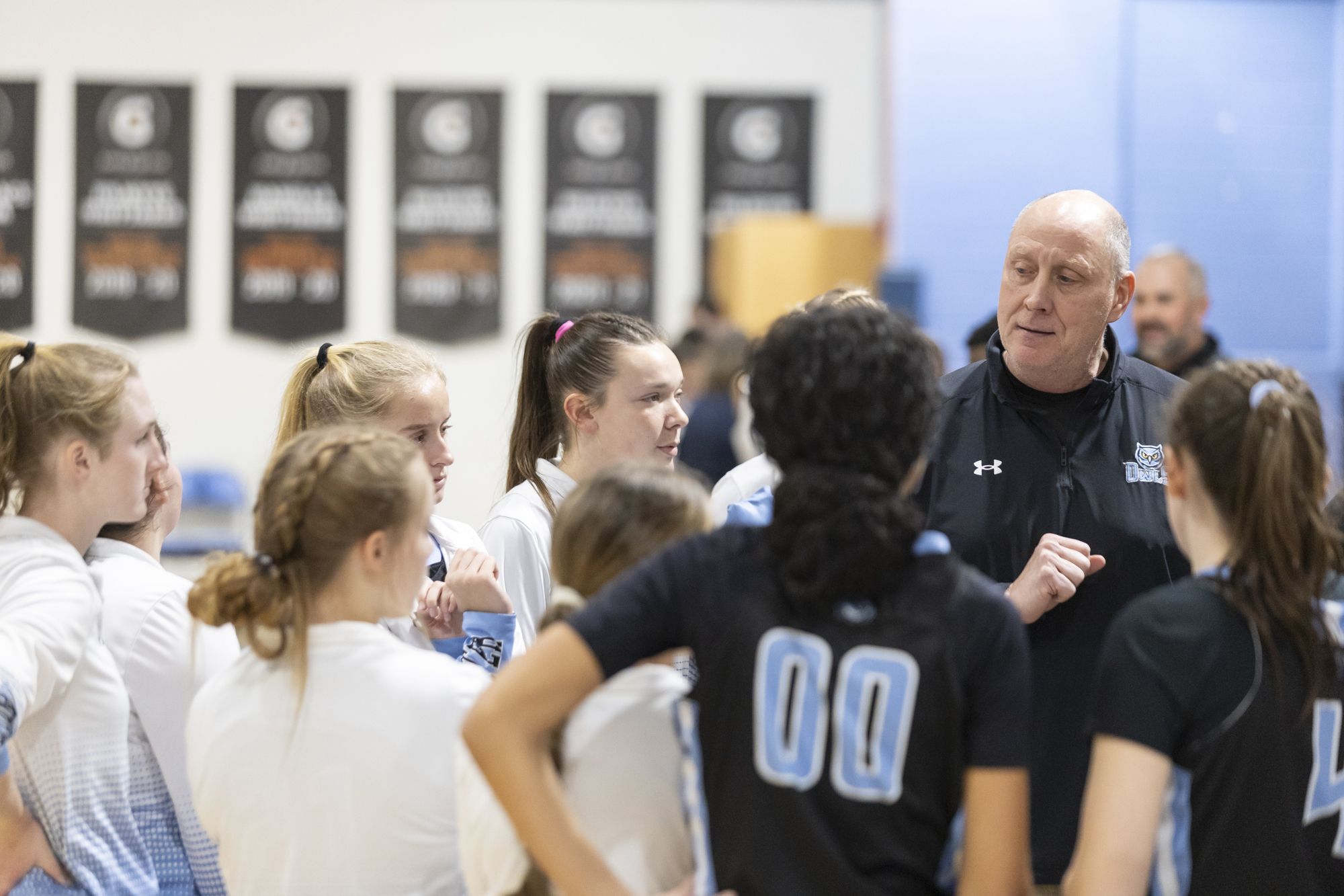 Westminster Head Coach David Urban speaks to his team before...