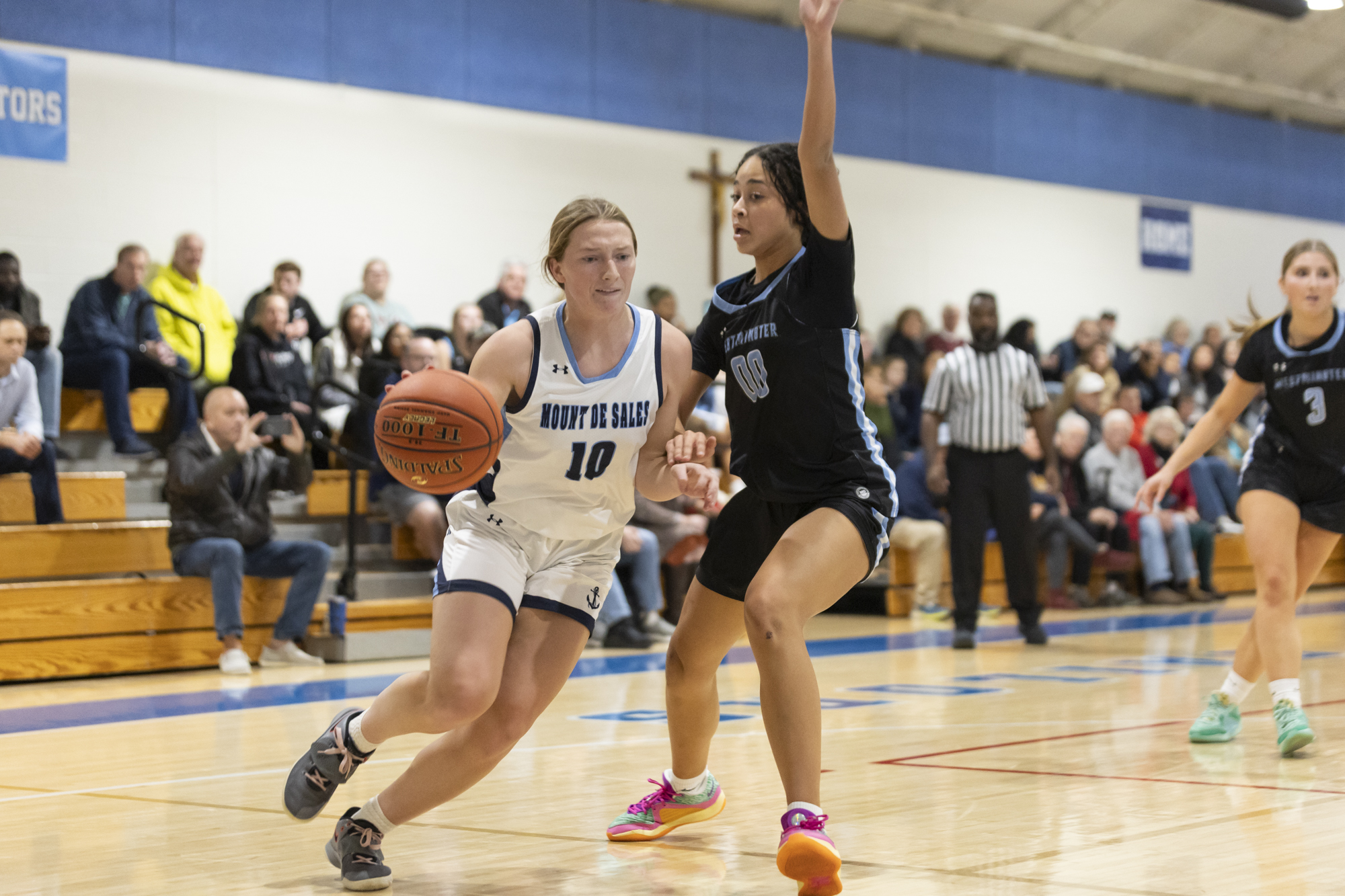 Cecilia Hannibal drives the baseline against Westminster’s Xaviah Burgee during...