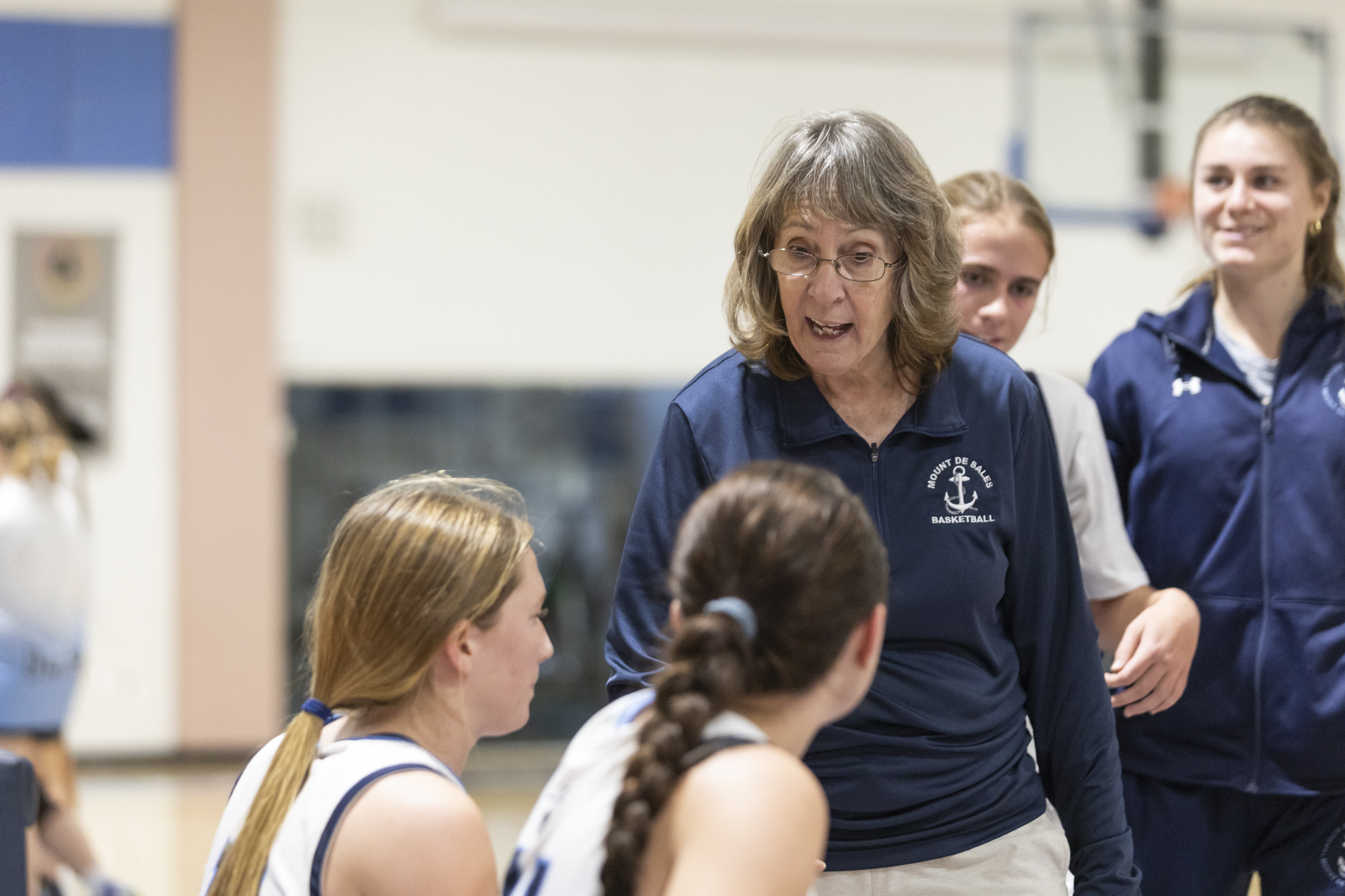 Mount De Sales Academy Head Coach Trish Armstrong speaks to...