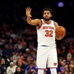 Nov 20, 2024; Phoenix, Arizona, USA; New York Knicks center Karl-Anthony Towns (32) handles the ball during the fourth quarter against the Phoenix Suns at Footprint Center. Mandatory Credit: Mark J. Rebilas-Imagn Images