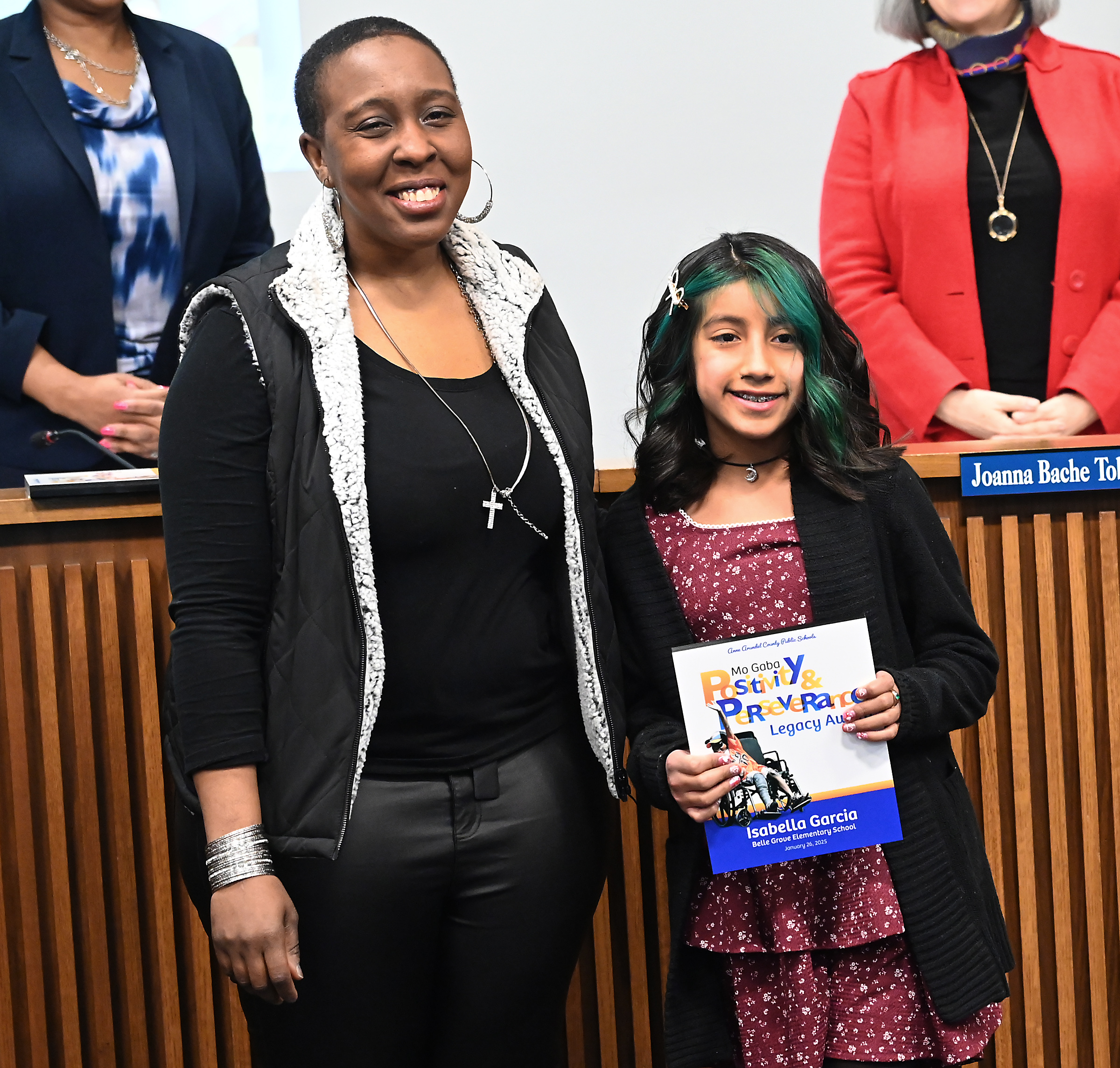 Isabella Garcia, Belle Grove Elementary, poses for a photo with,...