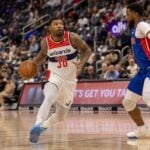 Mar 11, 2025; Detroit, Michigan, USA; Washington Wizards guard Marcus Smart (36) drives to the basket as Detroit Pistons guard Malik Beasley (5) defends during the first half at Little Caesars Arena. Mandatory Credit: David Reginek-Imagn Images